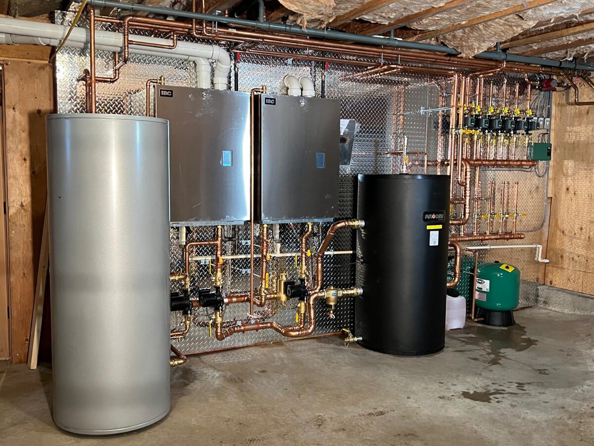 Dual-boiler install with buffer tanks delivered for a heating contractor client