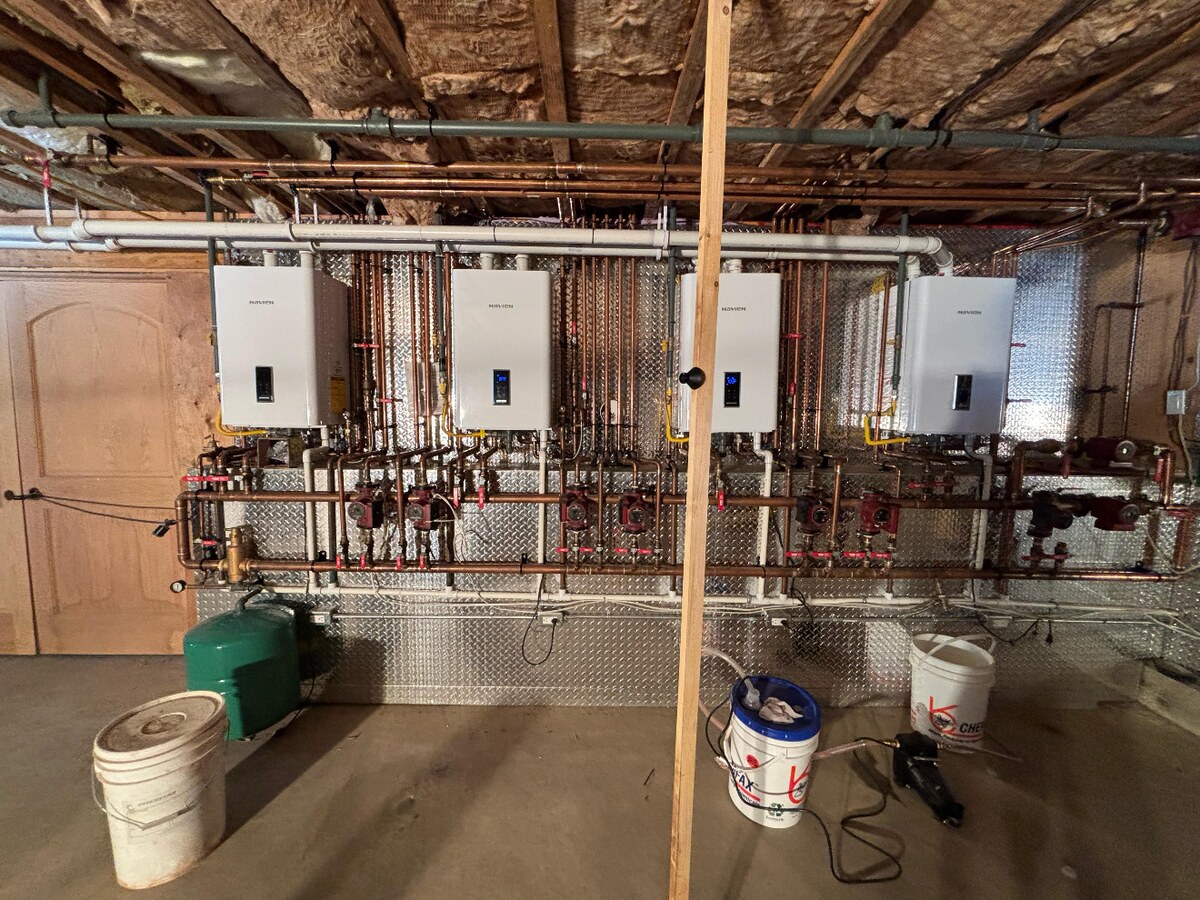 4-tankless mechanical room install delivered for an HVAC client